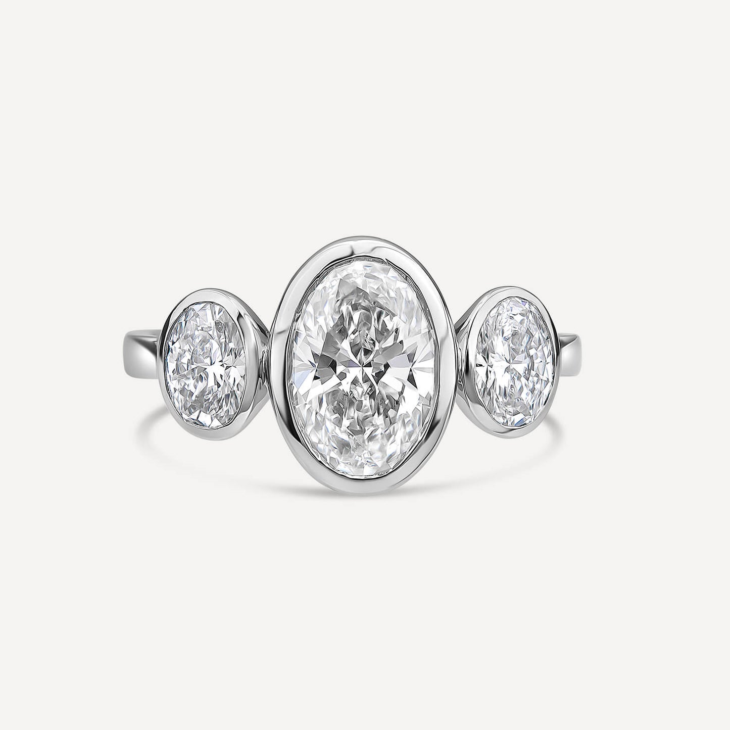 Born Platinum Lab Grown 2.80ct Oval Diamond Three Stone Bezel Set Ring