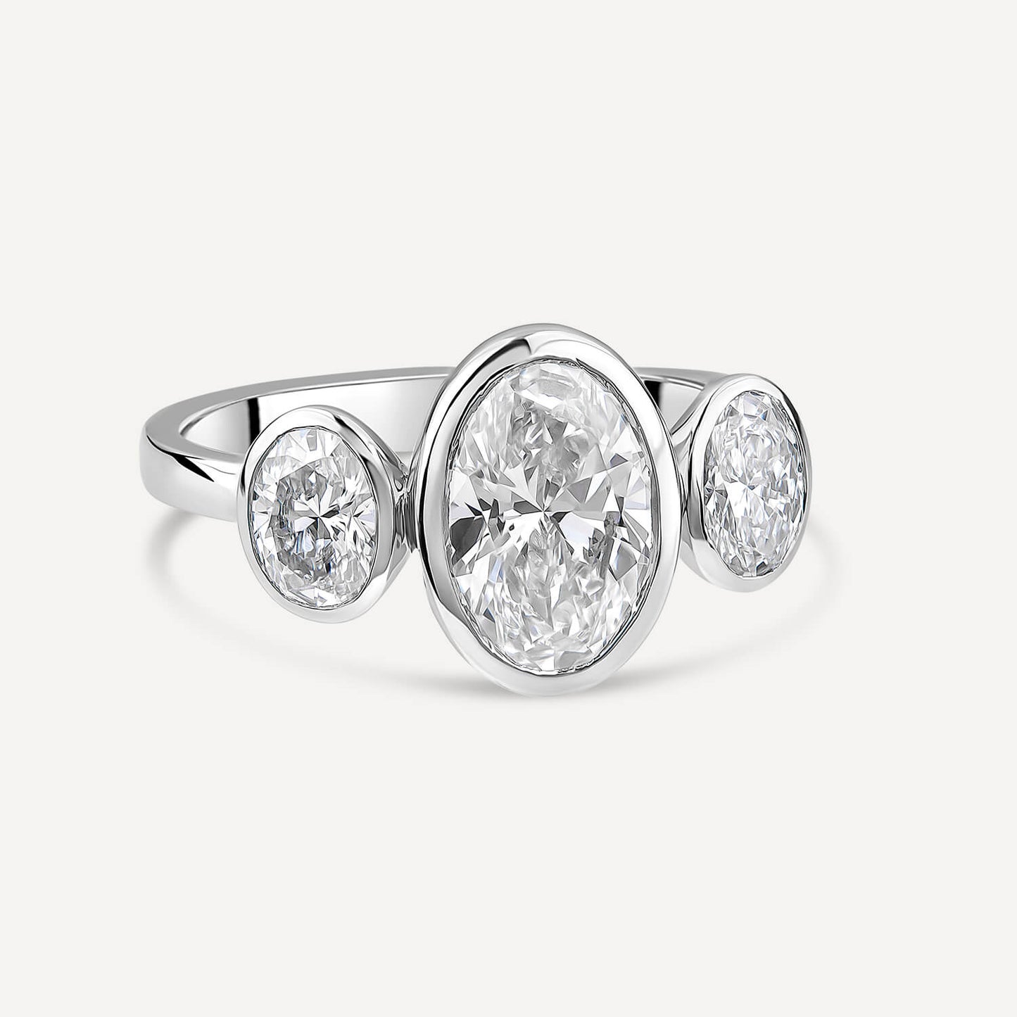 Born Platinum Lab Grown 2.80ct Oval Diamond Three Stone Bezel Set Ring